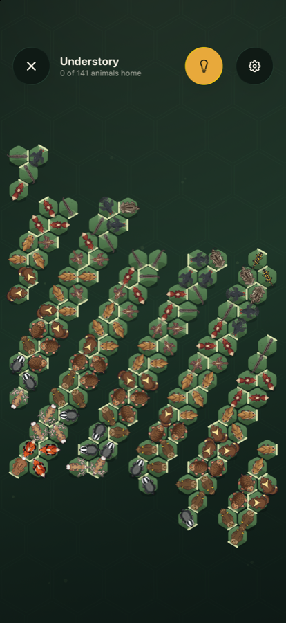 A puzzle board full of forest animals sitting on green hexagons.